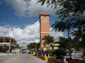 worst reasons to retire in Belize Street, park, and clock tower in Orange Walk Town, Belize – Best Places In The World To Retire – International Living